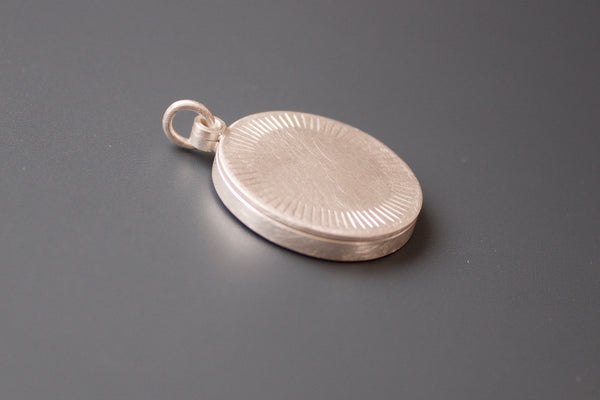 minimalist sterling silver round photo locket with aureole