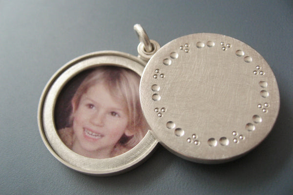 elegant solid silver locket for two pictures with dots pattern
