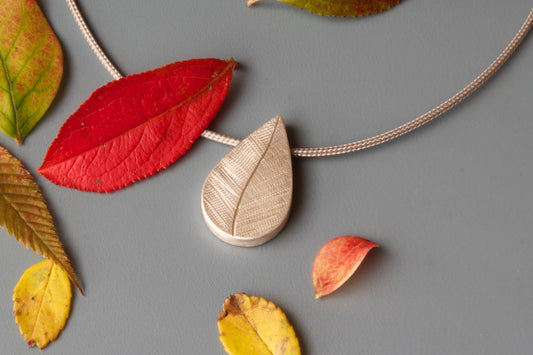 delicate leaf pendant for one photo in sterling silver