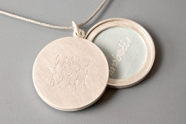 large sterling silver locket for two pictures typographic inscription
