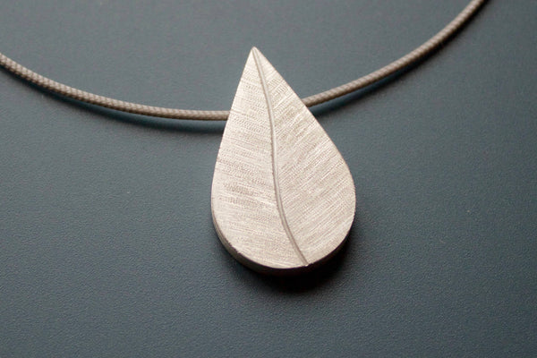 drop shaped  leaf photo pendant handmade in sterling silver