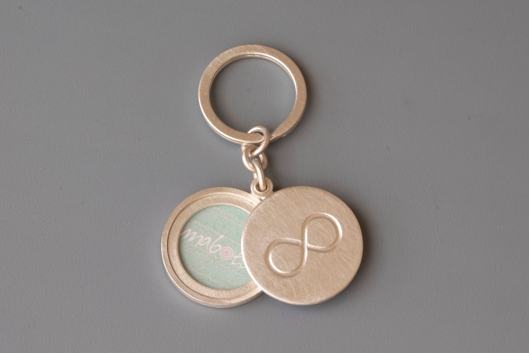 solid sterling silver keychain locket with infinity sign for one photo