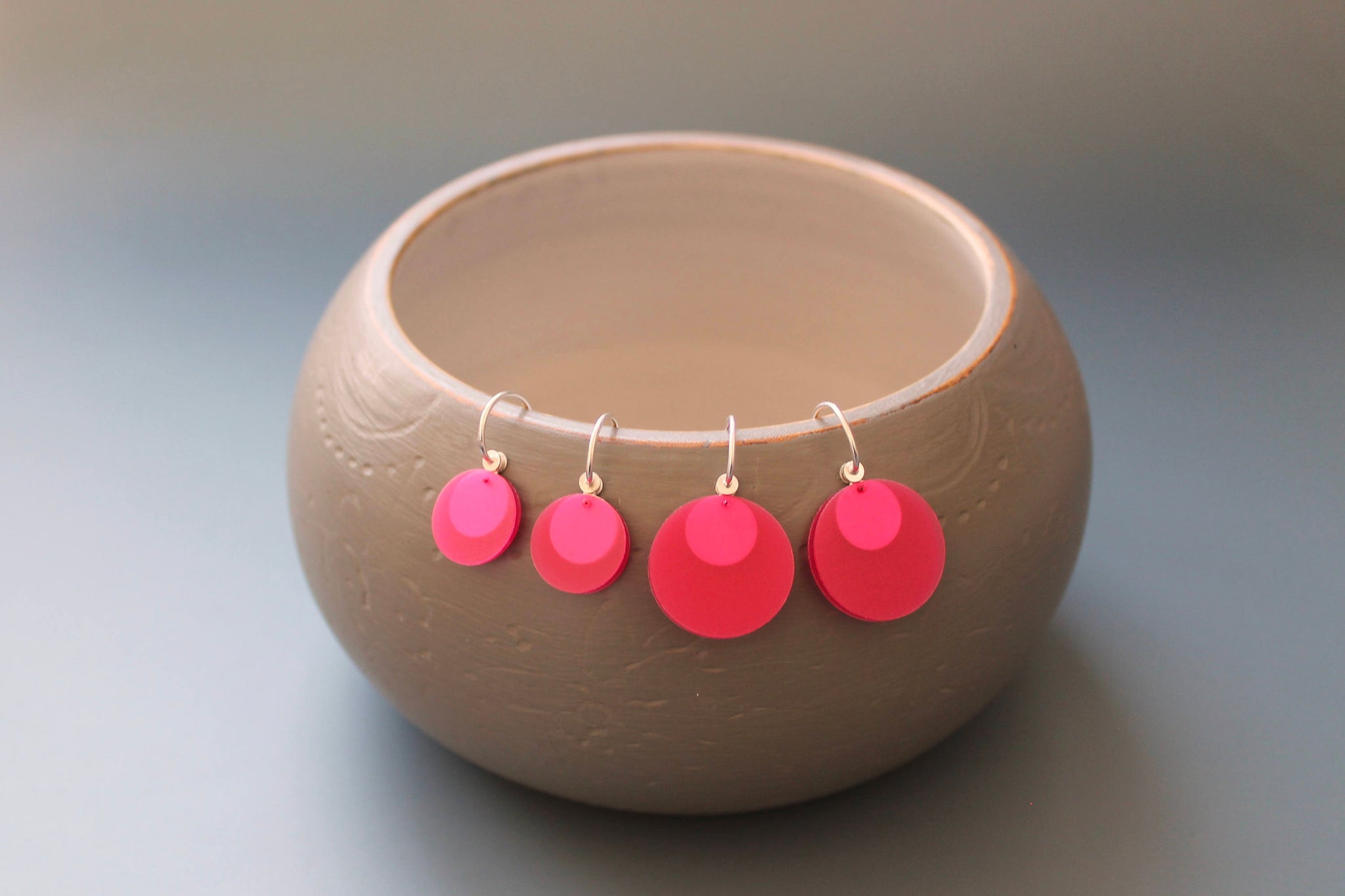 light earrings in sterling silver and raspberry pink dangle earrings