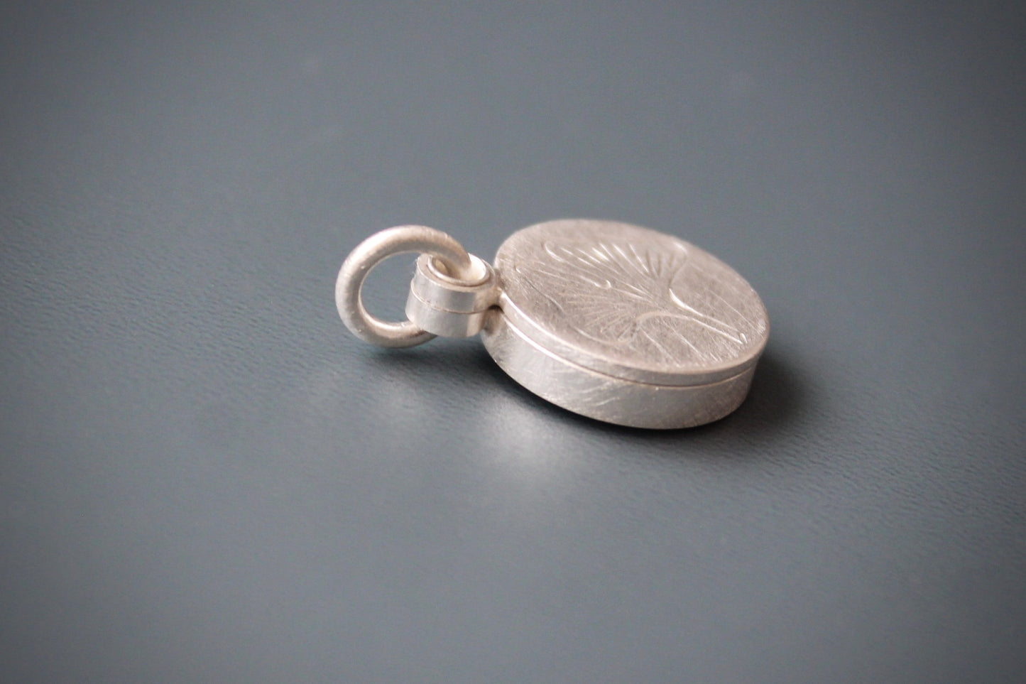 small sterling silver picture locket with gingko leaf