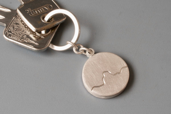 silver keychain locket for one photo with mountain range design