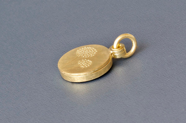 kleines goldenes Medaillon für ein Foto aus 750/000 Gold mit Pusteblumen