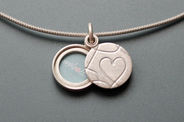 romantic picture locket with elegant heart design handmade in sterling silver