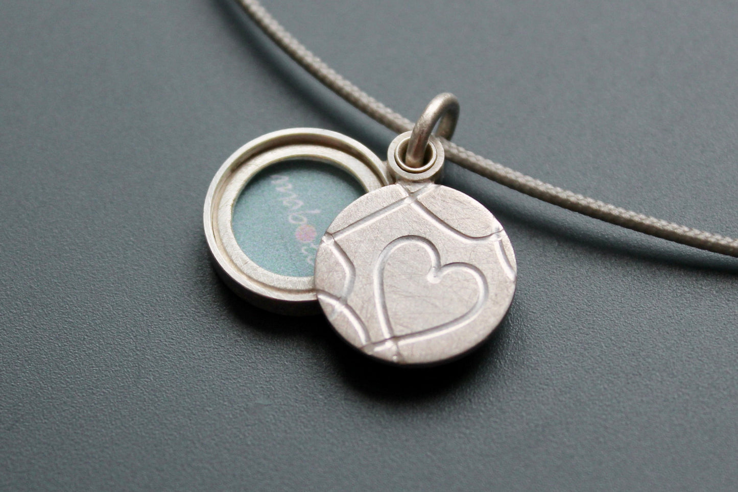 romantic picture locket with elegant heart design handmade in sterling silver