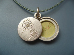 small silver mabotte locket for one picture with sunflowers