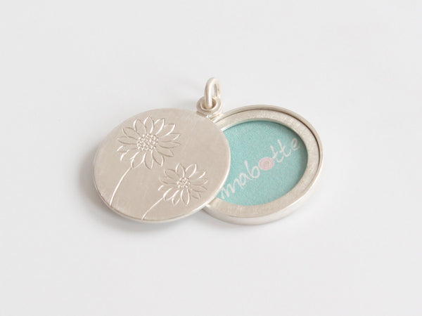unique sunflower locket in sterling silver for one photo