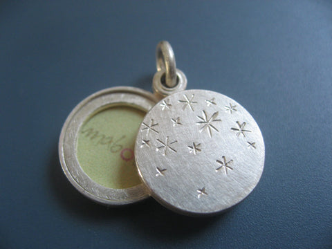 small double sided photo locket with starry night design in sterling silver