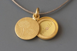 elegant and small gold locket for one photo with dandelion design