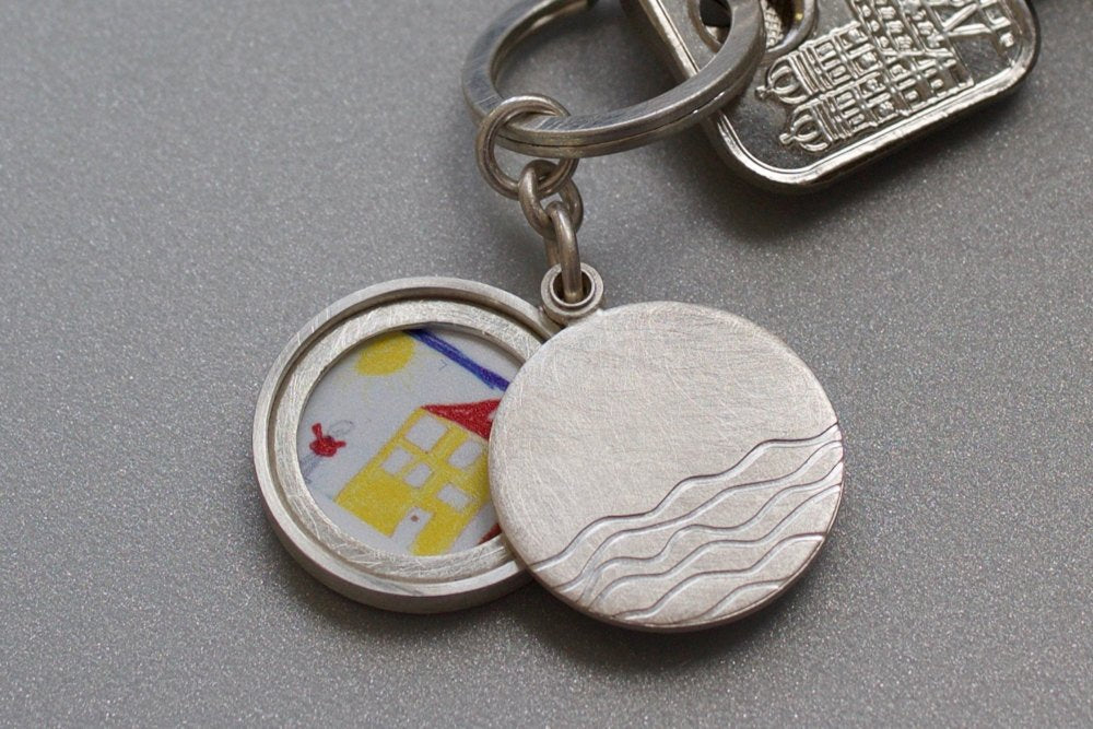 minimalist silver keychain locket with waves for one photo